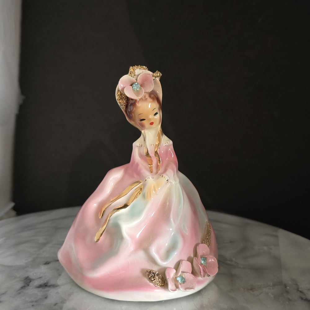 Elegant Pink and Gold Ceramic Figurine